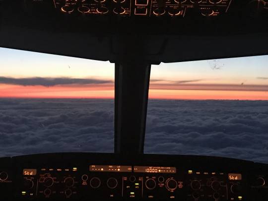 Employee story: Woman at the controls of an airplane